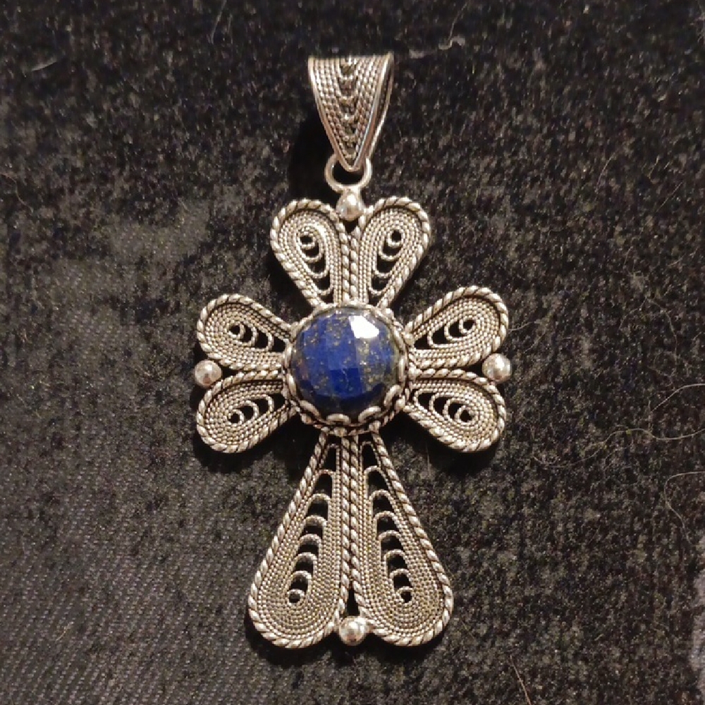 Elegant Silver Cross Pendant with Blue Gemstone